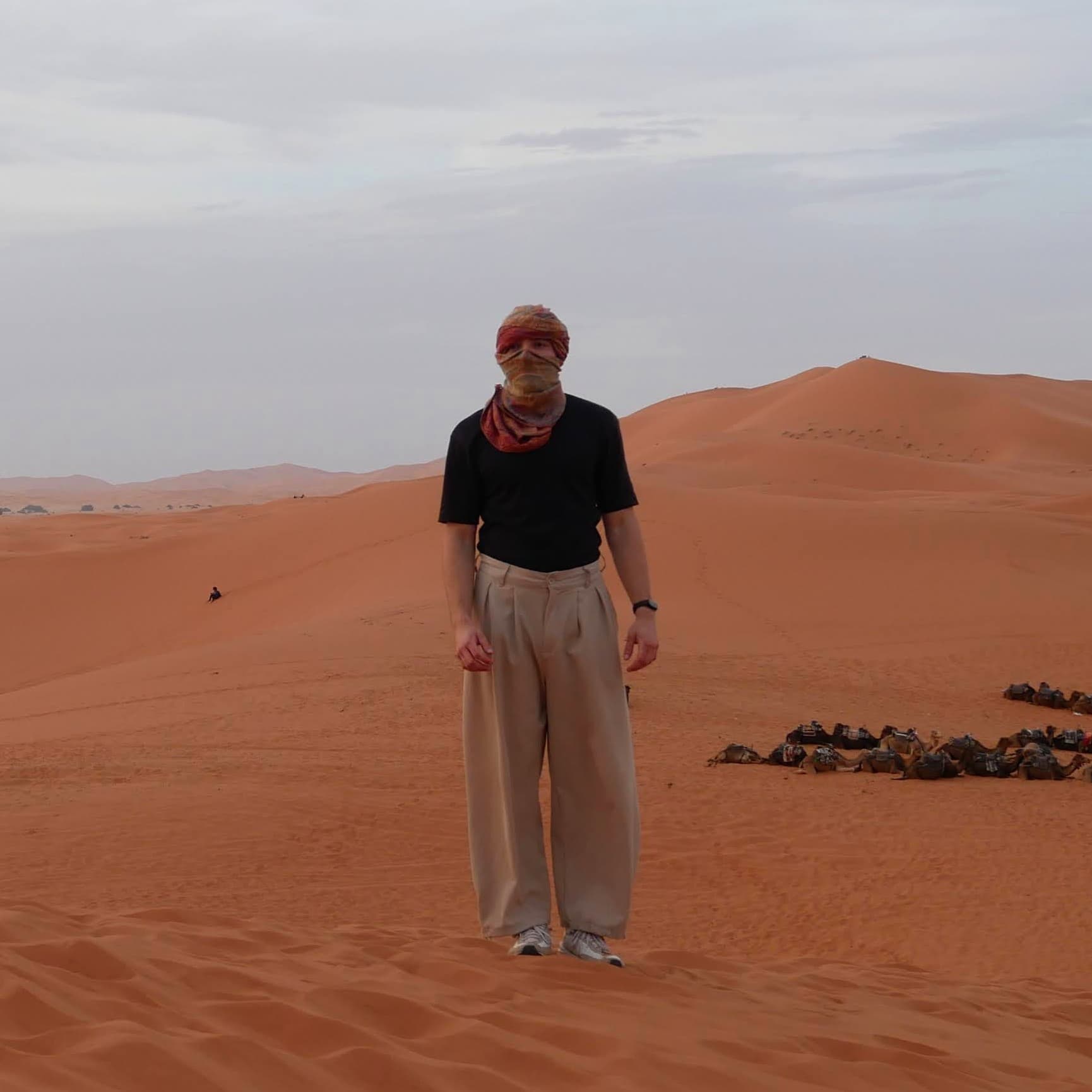 Ondrej standing in the Moroccan desert